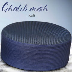 A navy blue woven Kufi prayer cap made of Ghalib mesh fabric, shown from a three-quarters angle against a light blue gradient background with text overlays.